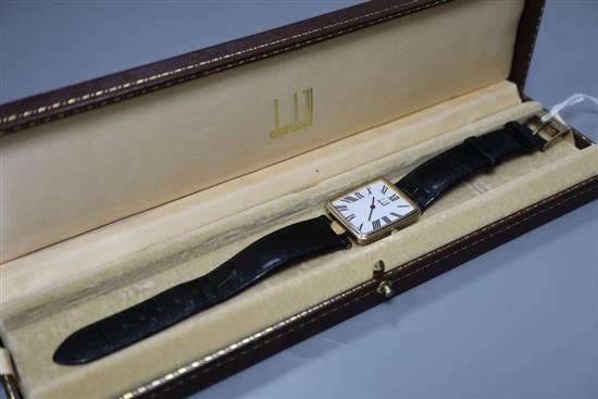 A gentlemans stylish silver gilt Dunhill quartz wrist watch, with Roman dial, on leather strap with Dunhill buckle, in Dunhill box,